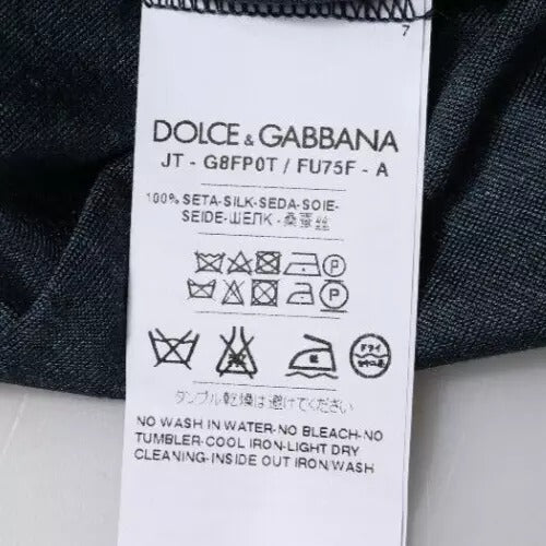 Tag on clothing item indicating brand and care instructions