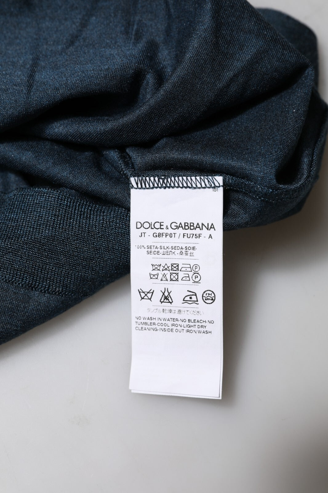 Tag on blue denim fabric