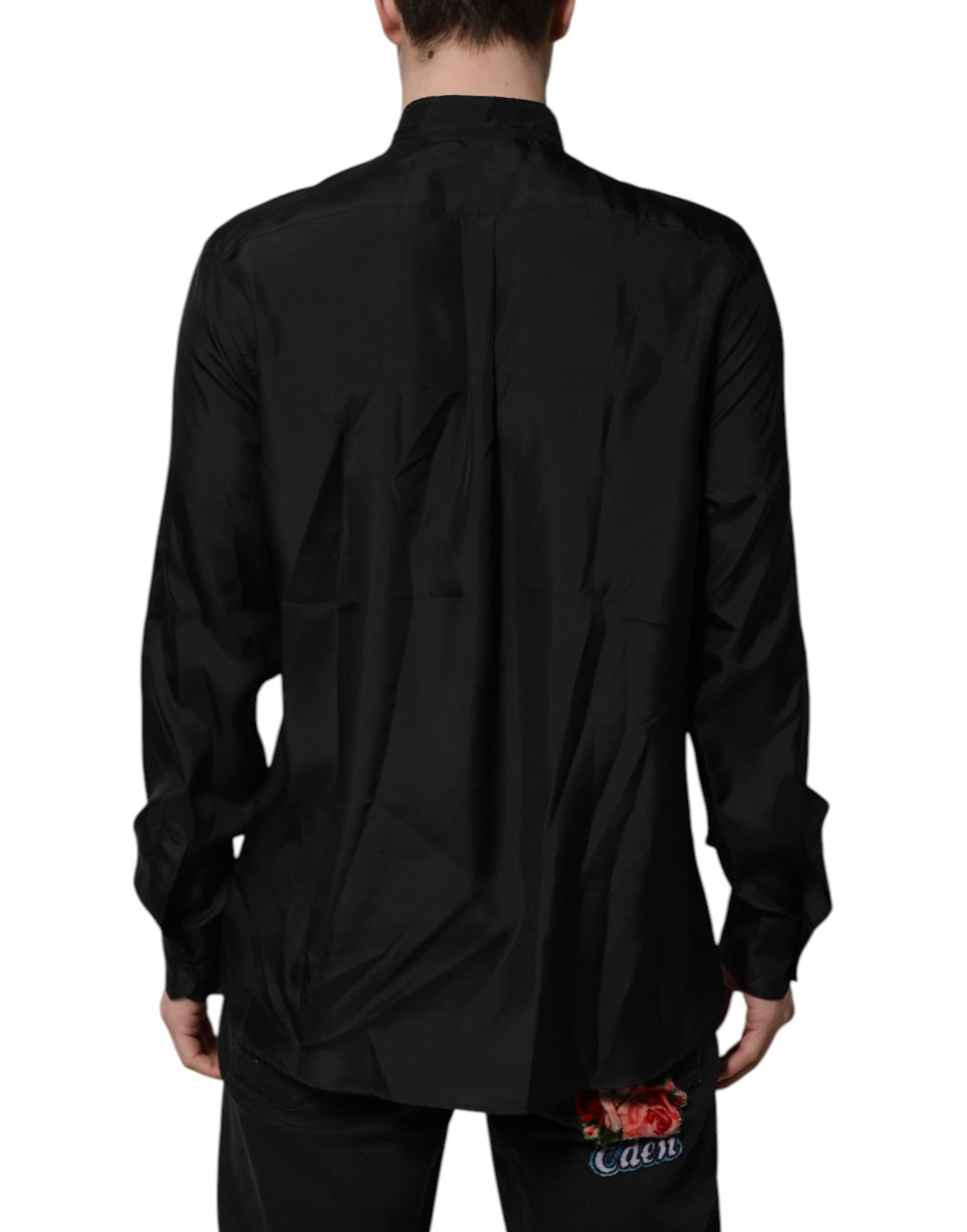 A dark blue silk men's formal dress shirt with a collar and long sleeves