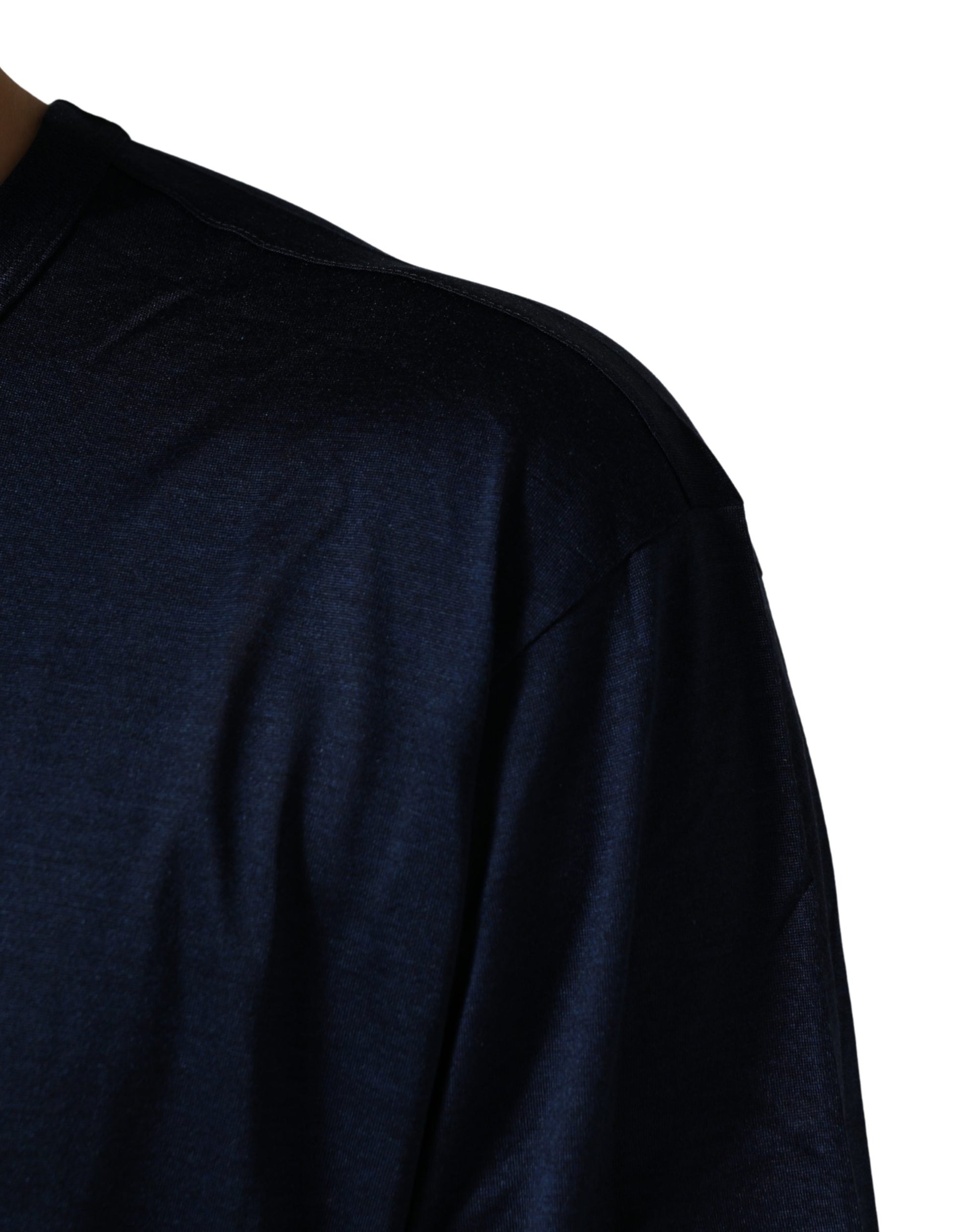 Navy blue long sleeve shirt on a mannequin torso