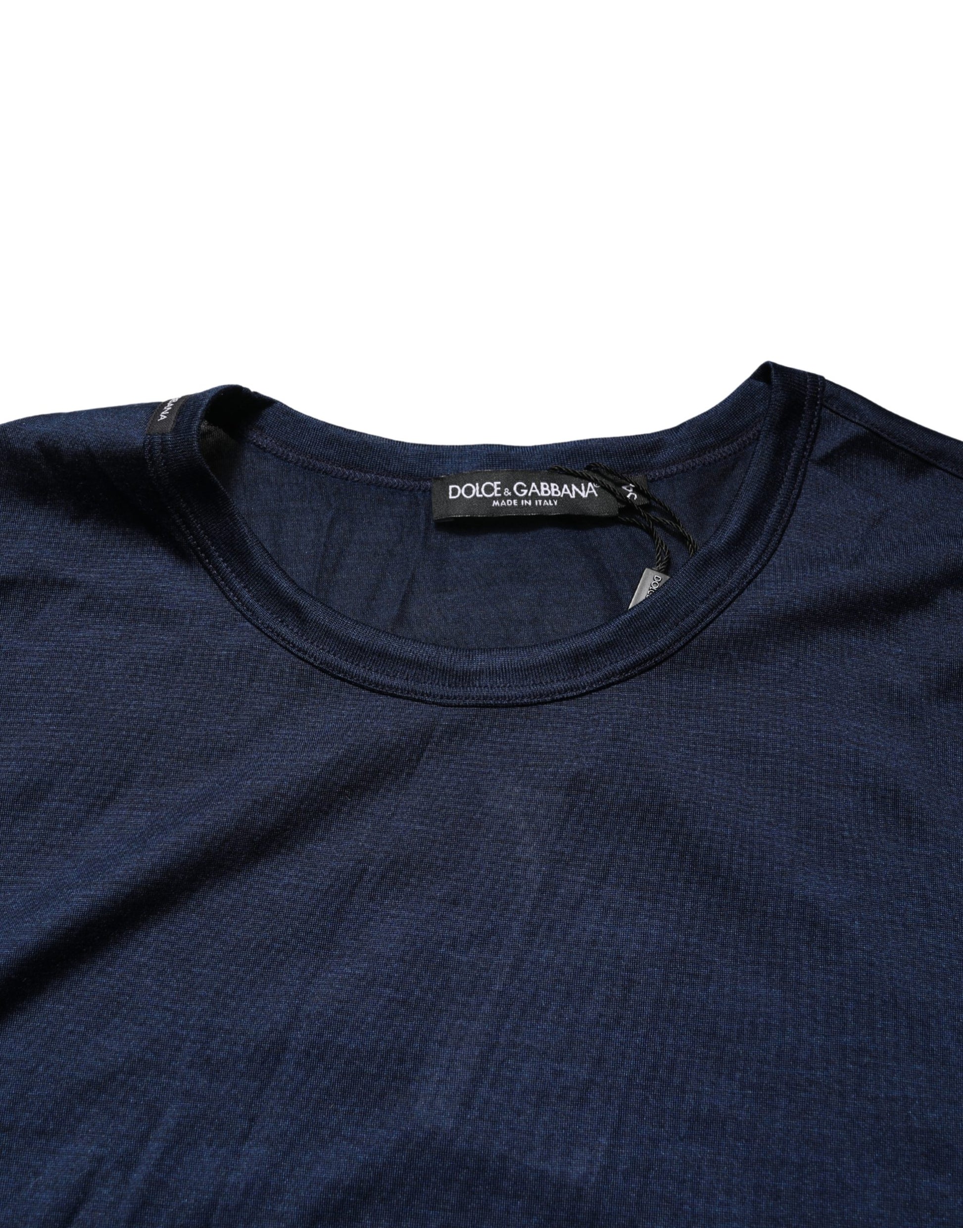 Blue long sleeve shirt on hanger