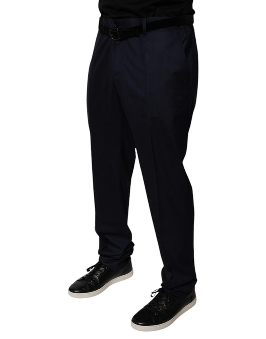 A pair of dark blue tapered formal dress pants from the brand Dolce & Gabbana