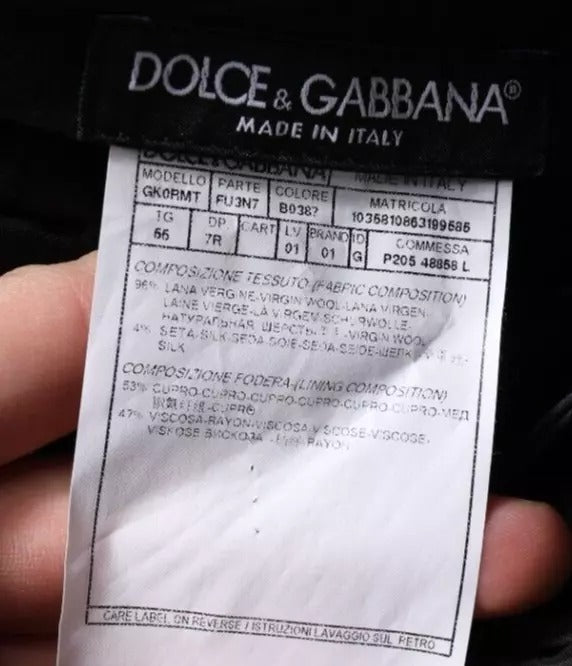 A pair of dark blue tapered formal dress pants from Dolce & Gabbana