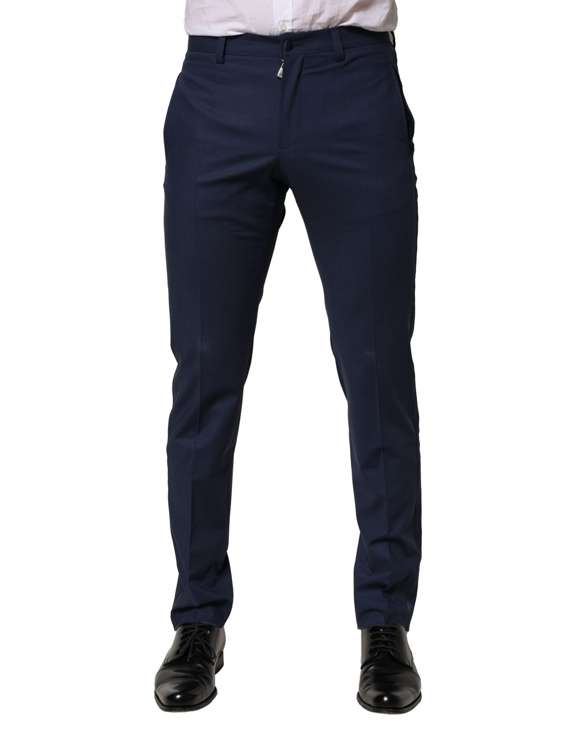 A pair of dark blue wool dress pants from Dolce & Gabbana, featuring a slim fit and a formal design