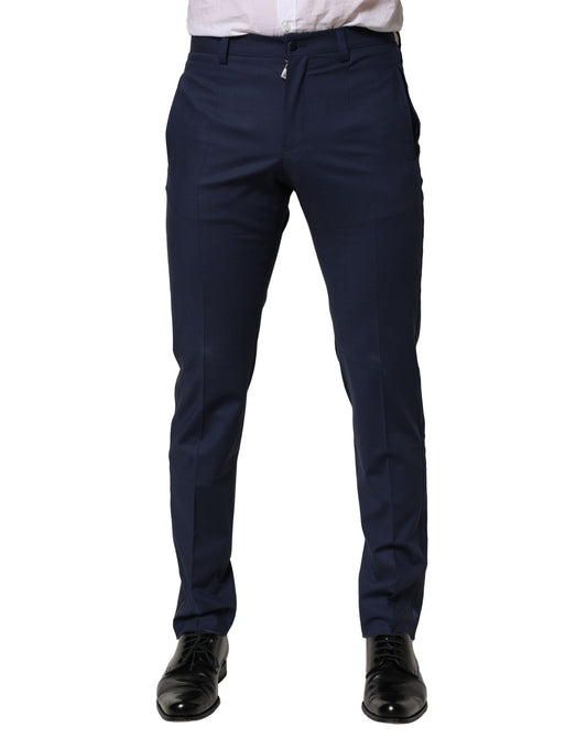 A pair of dark blue wool dress pants from Dolce & Gabbana, featuring a slim fit and a formal design