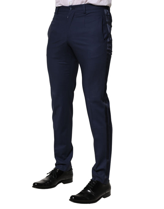 A pair of dark blue wool dress pants from Dolce & Gabbana, featuring a slim fit and a formal design