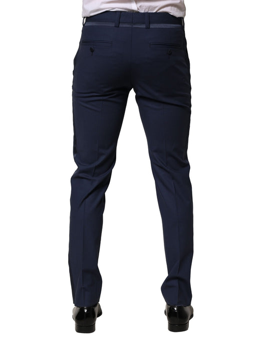 A pair of dark blue wool dress pants from Dolce & Gabbana, featuring a slim fit and visible brand logo