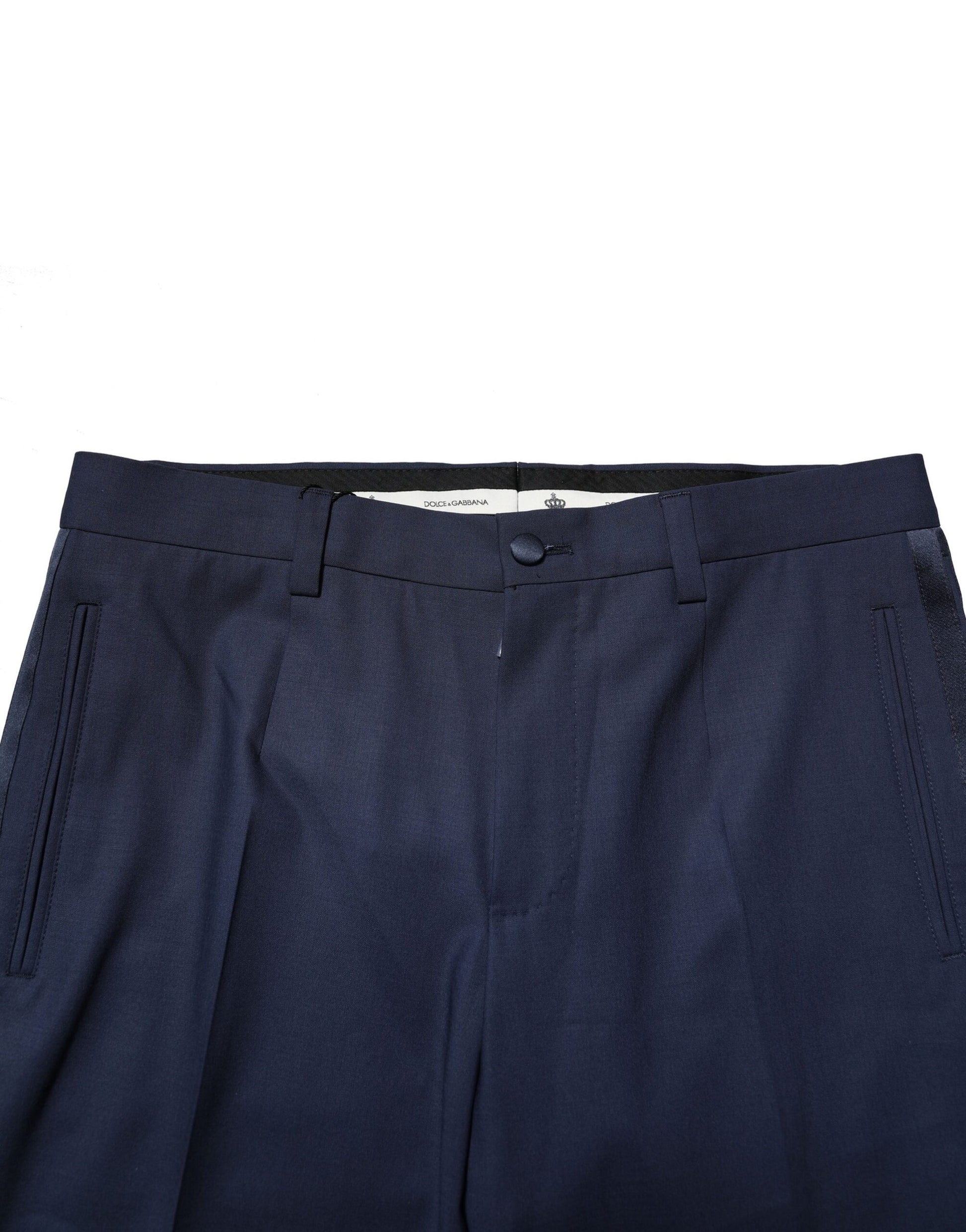 A pair of dark blue wool dress pants from Dolce & Gabbana, featuring a striped pattern and a button closure
