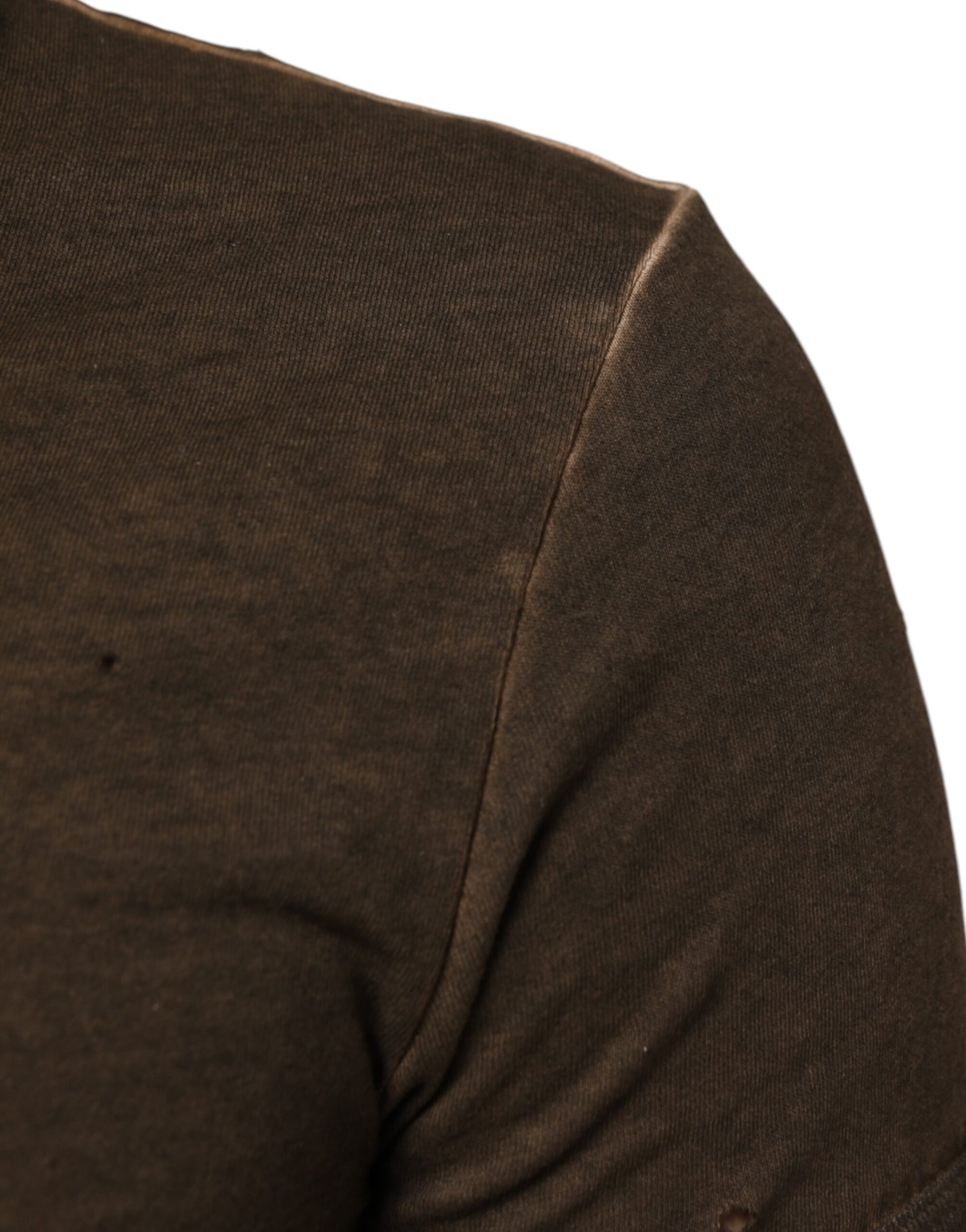 Brown sleeve with small holes on cuff