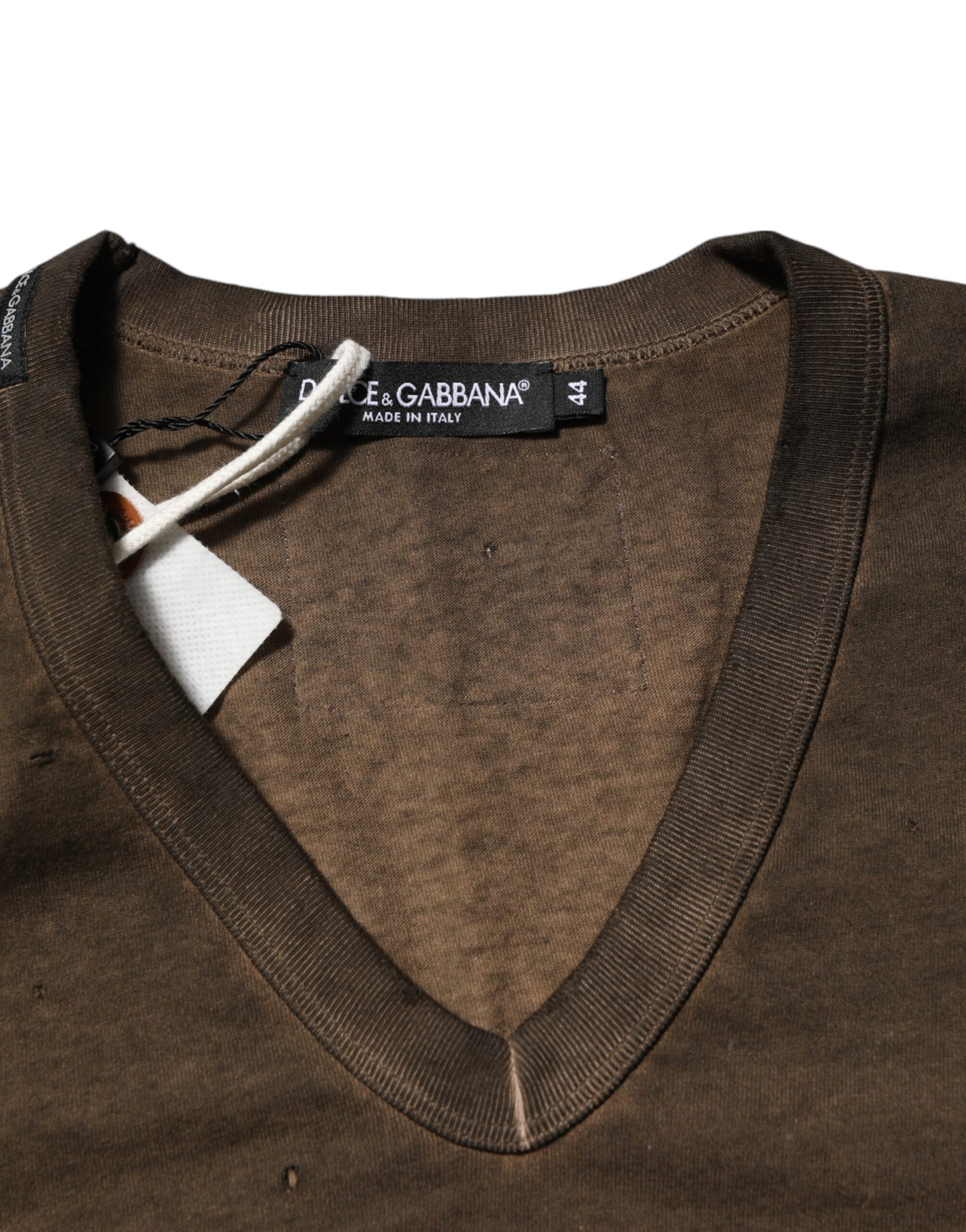 Brown v neck sweater on hanger