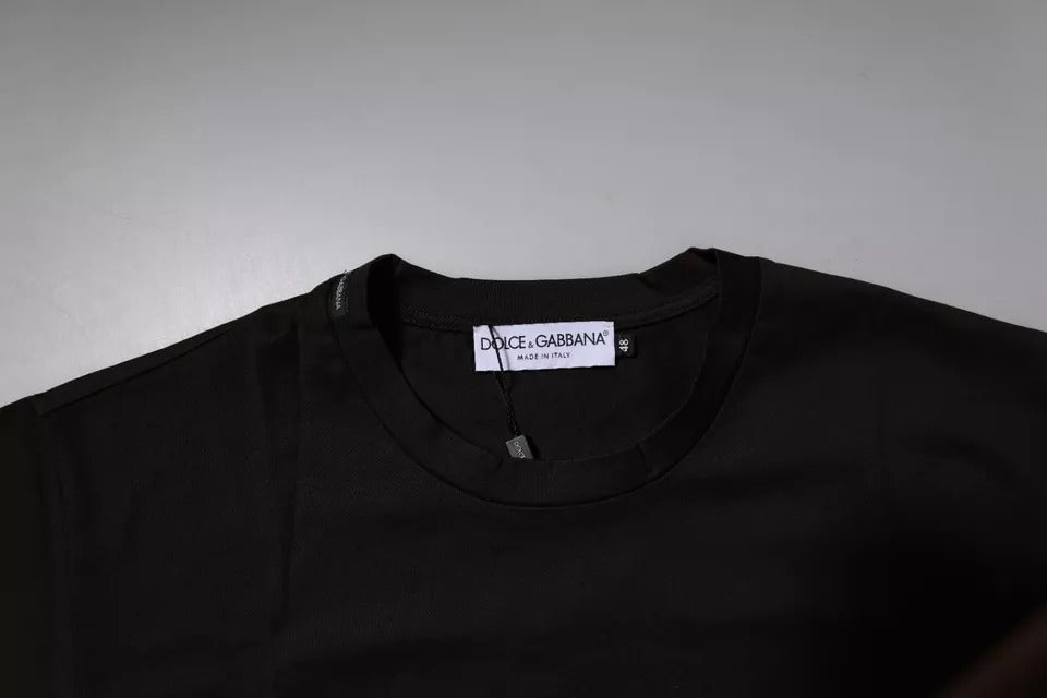 Black t-shirt on hanger