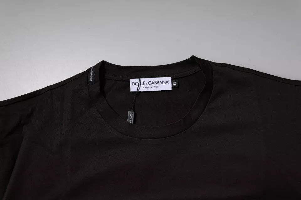 Black t-shirt on hanger