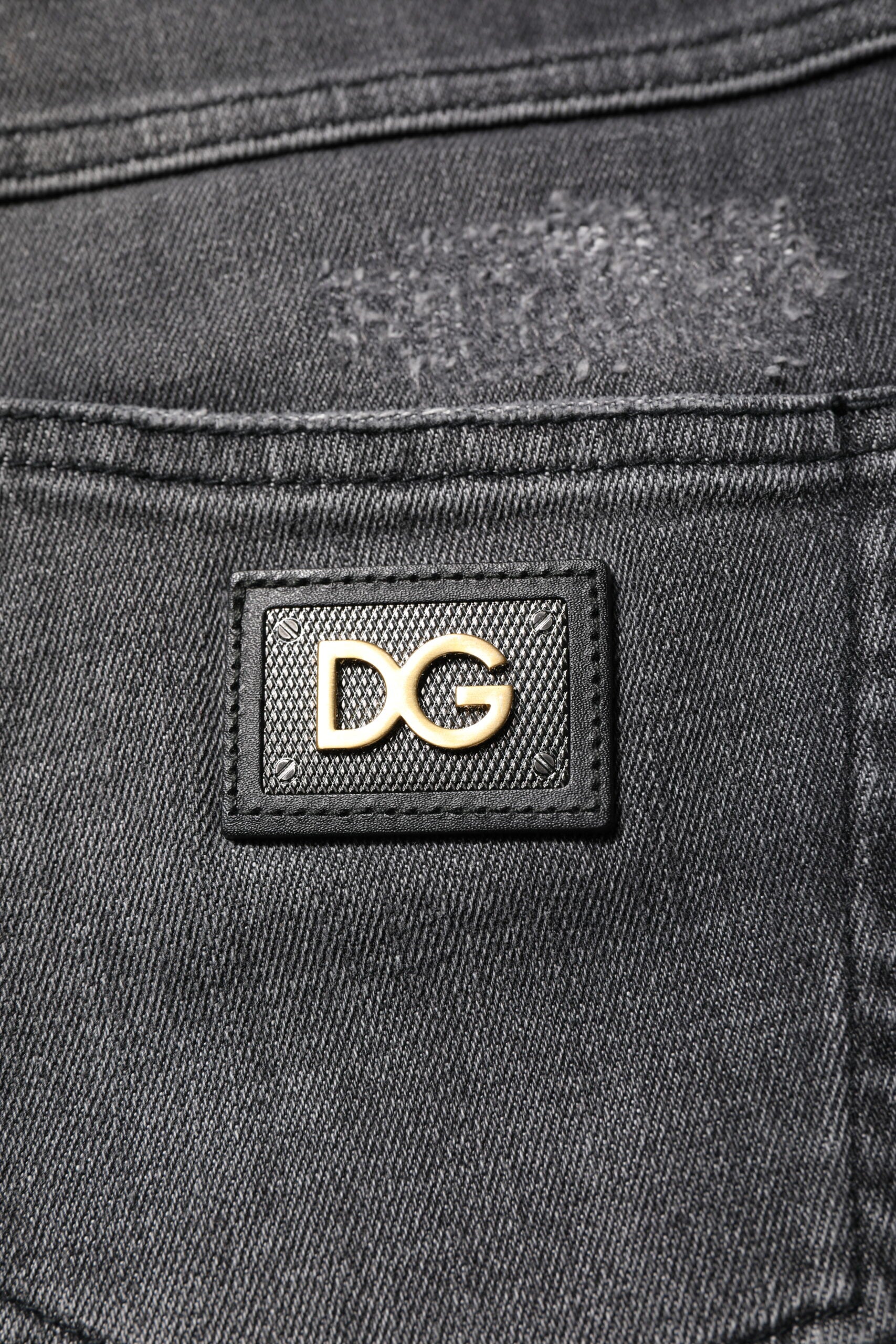 The jeans have a gold D&G logo on the waistband