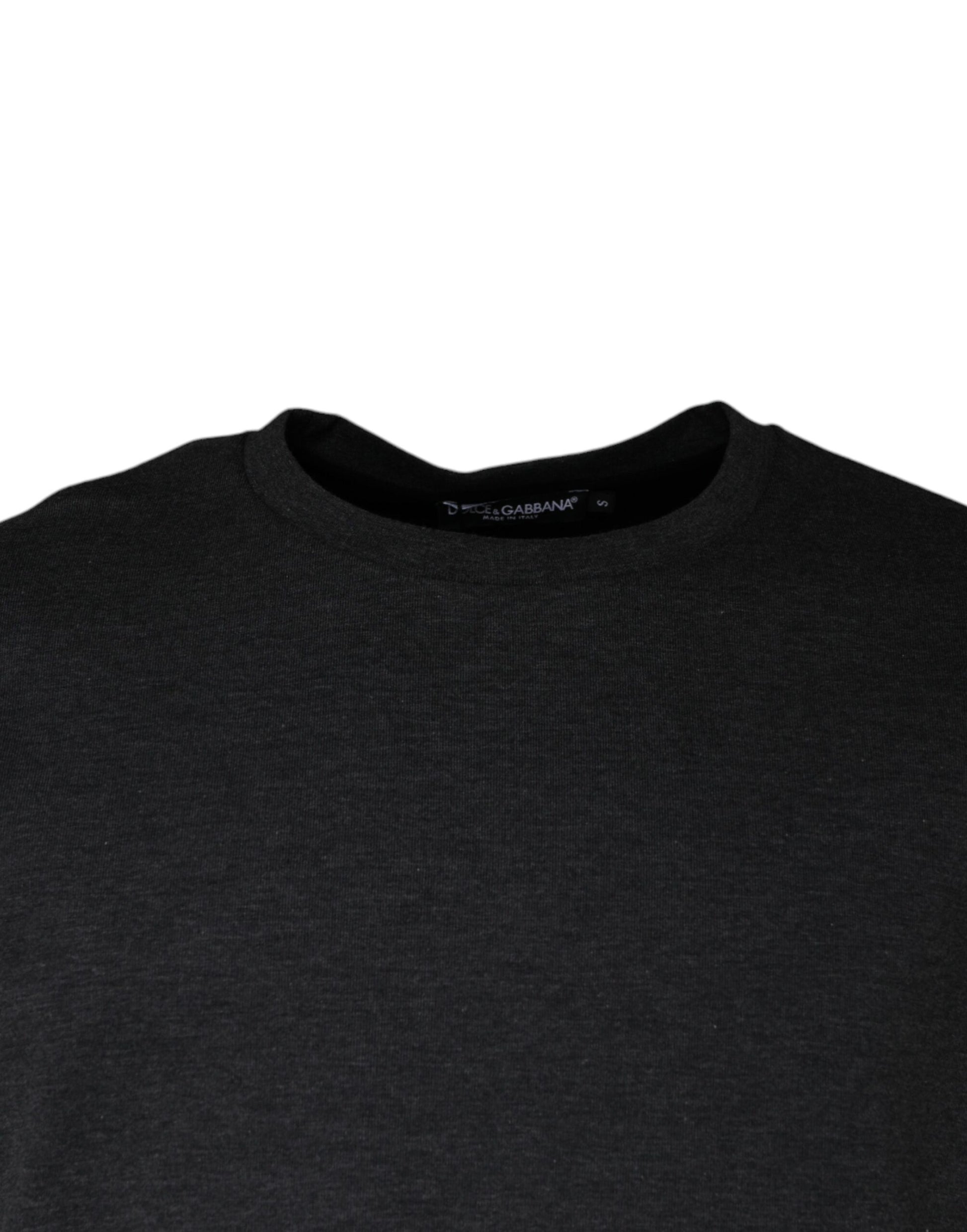 Black long sleeve shirt on hanger