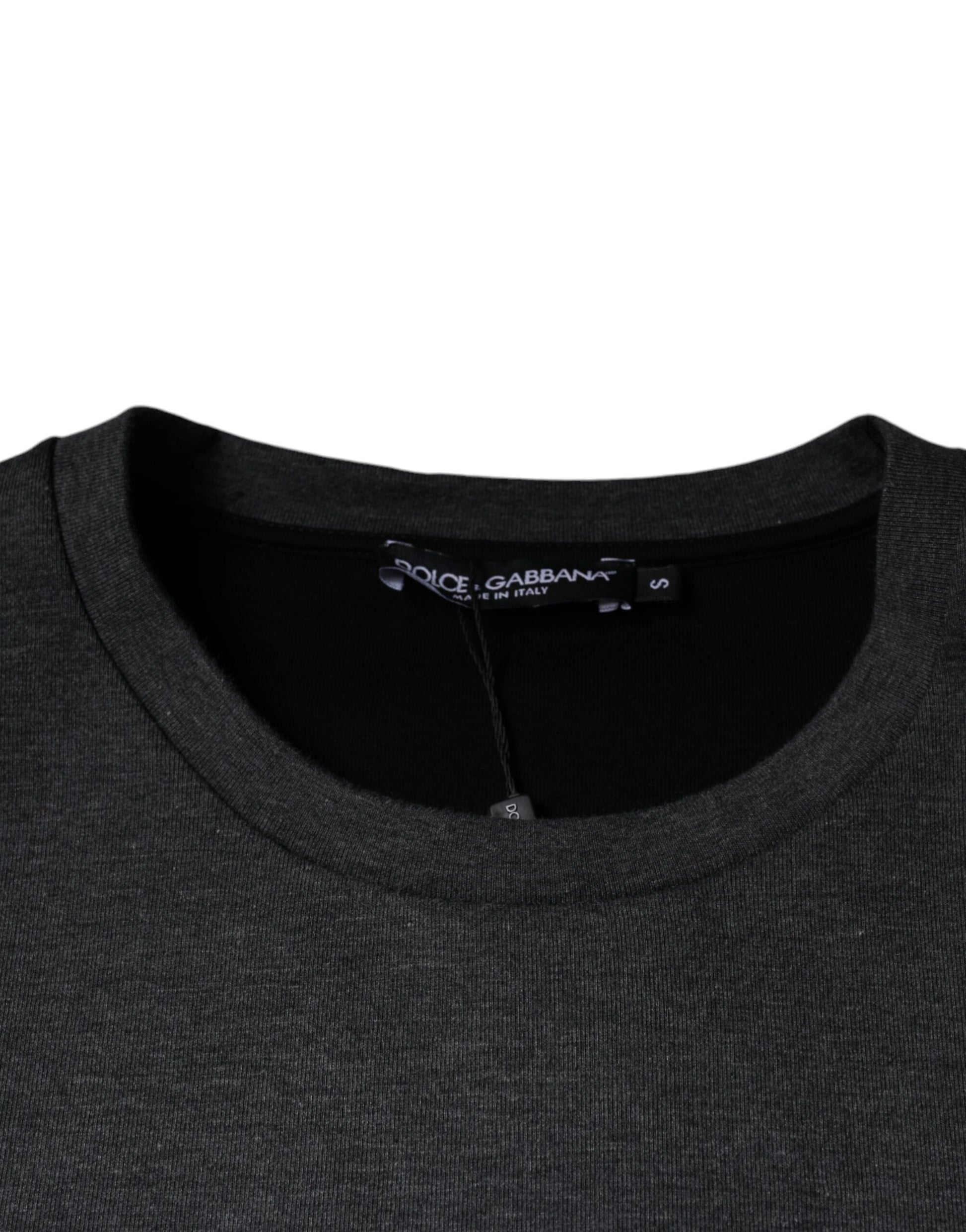 Black ribbed knit sweater on hanger