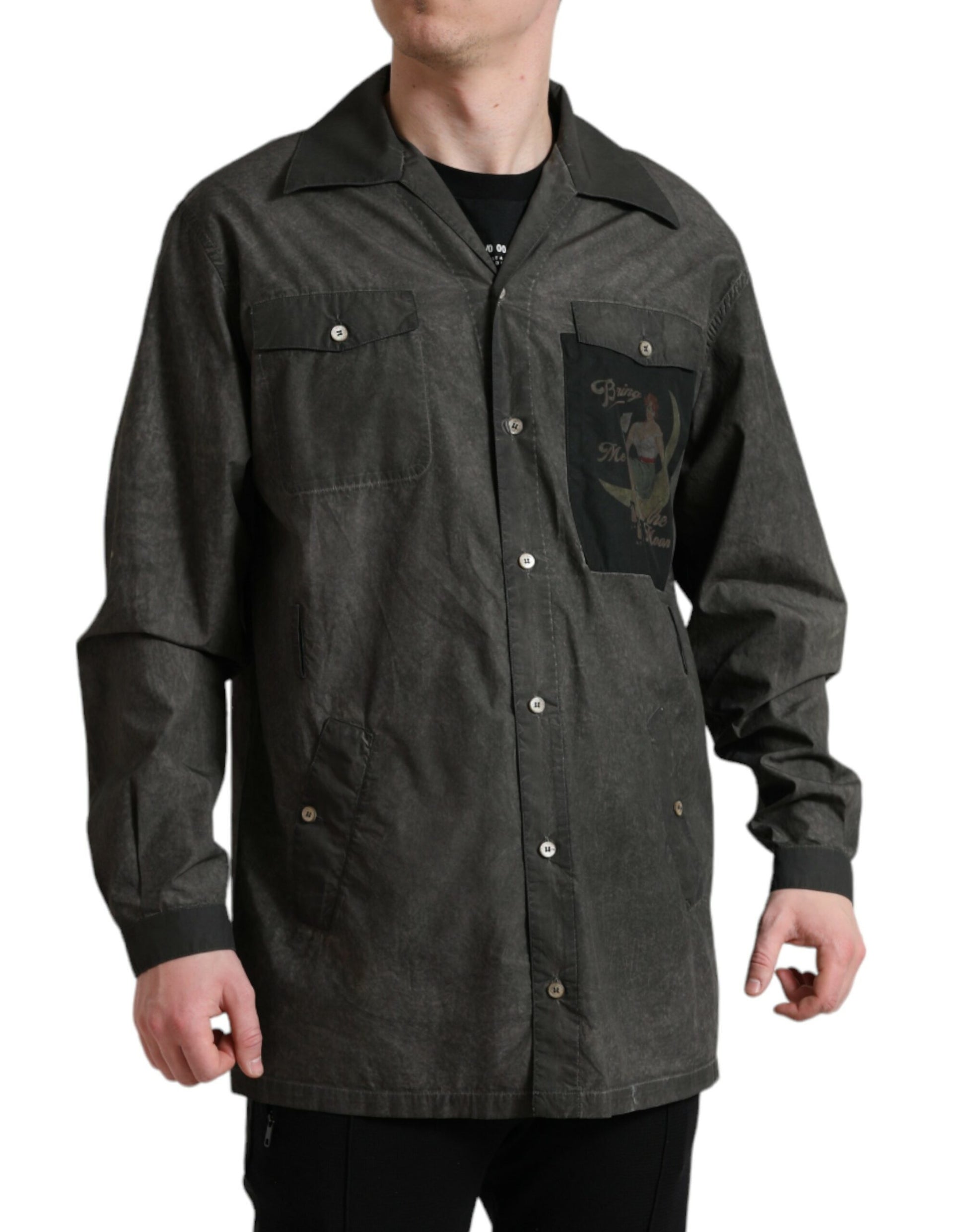 Man wearing dark jacket with pocket on left chest