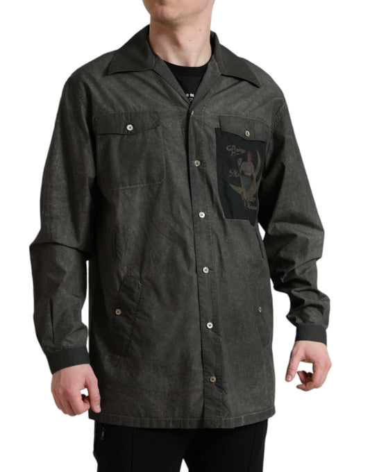 Man wearing dark jacket with pocket on left chest