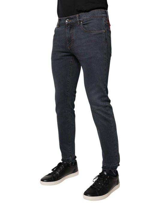 Man wearing blue jeans and black shoes