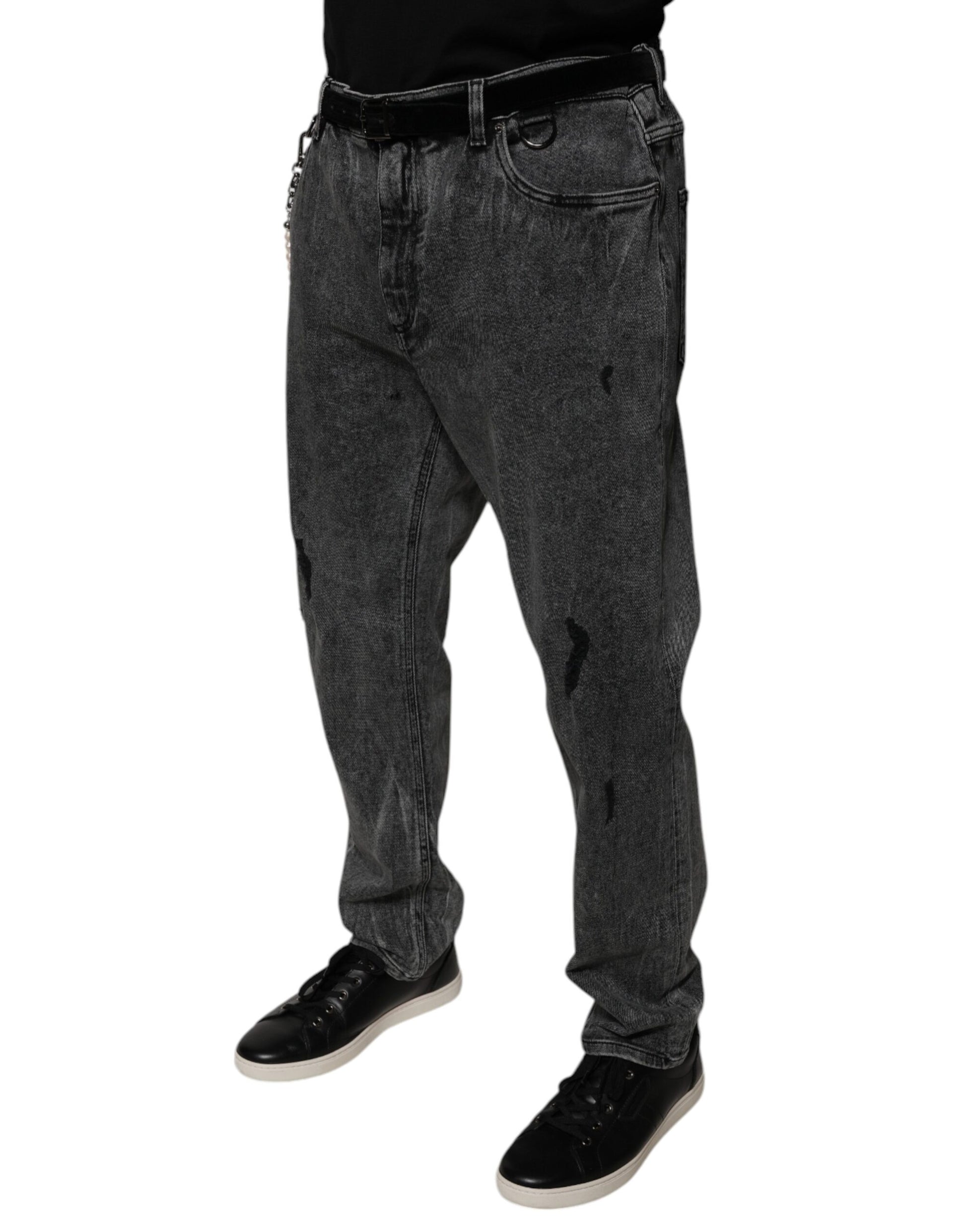 Man wearing jeans and black shoes