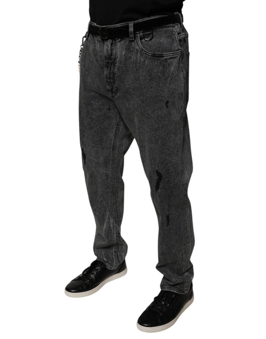Man wearing jeans and black shoes