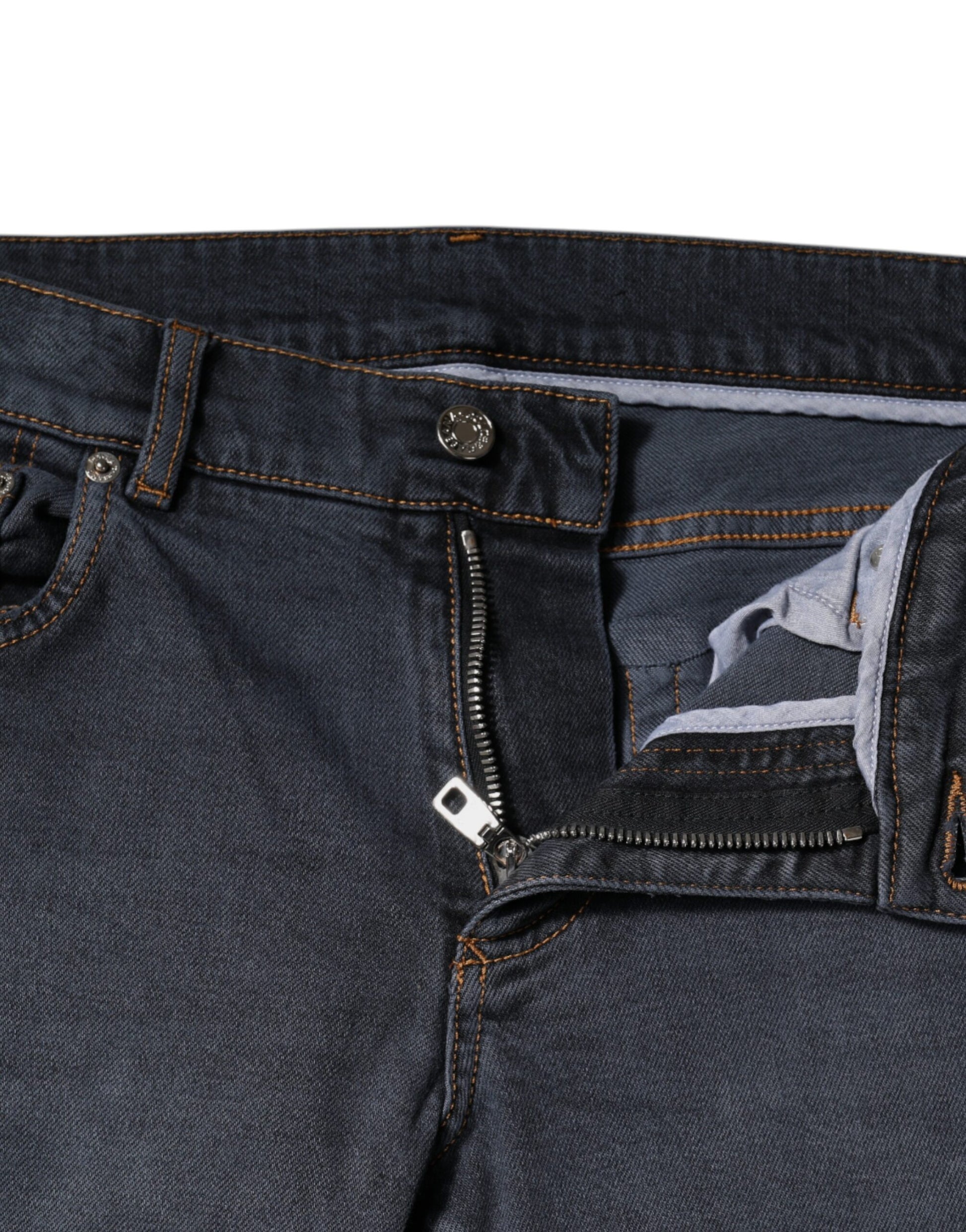 Blue denim jeans with zippered pocket on left leg