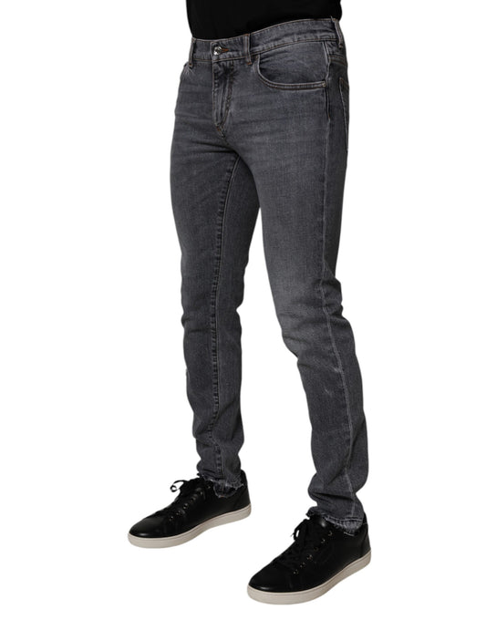 Man wearing blue jeans and black shoes