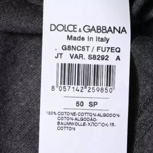 Tag on clothing item indicating brand and country of manufacture