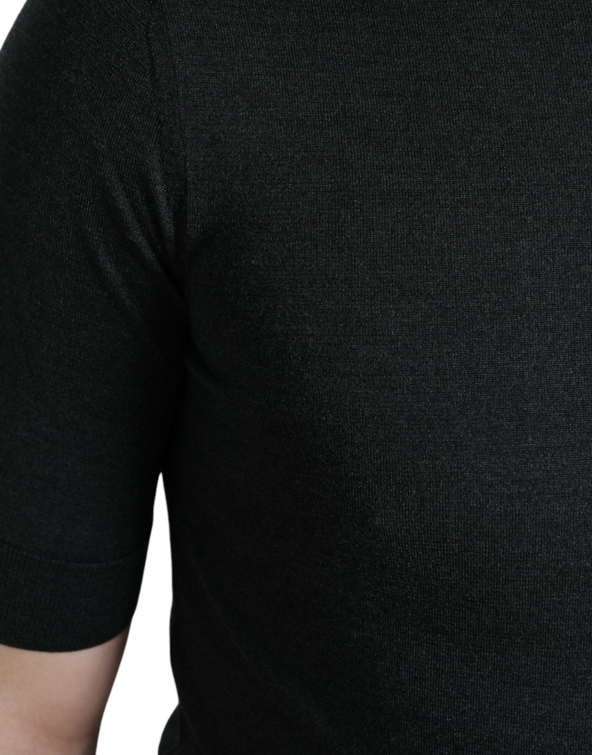Black knit sweater with ribbed neckline