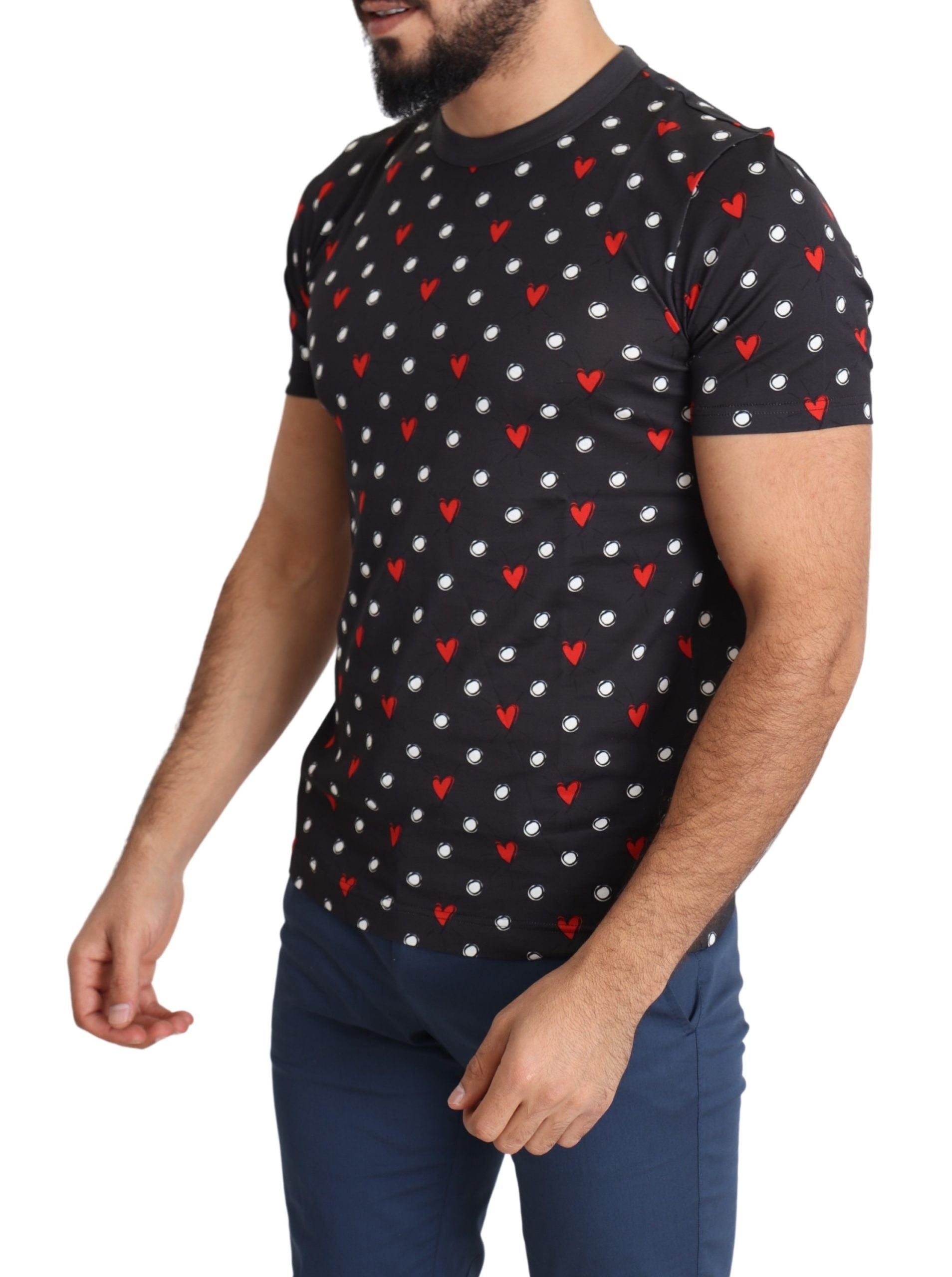 Man wearing black t-shirt with red hearts