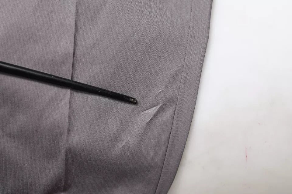 A pair of dark gray mid waist dress pants from Dolce & Gabbana