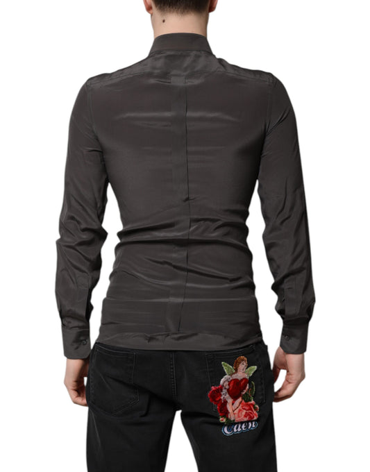 A dark gray silk formal shirt with gold accents, featuring a lapel and long sleeves