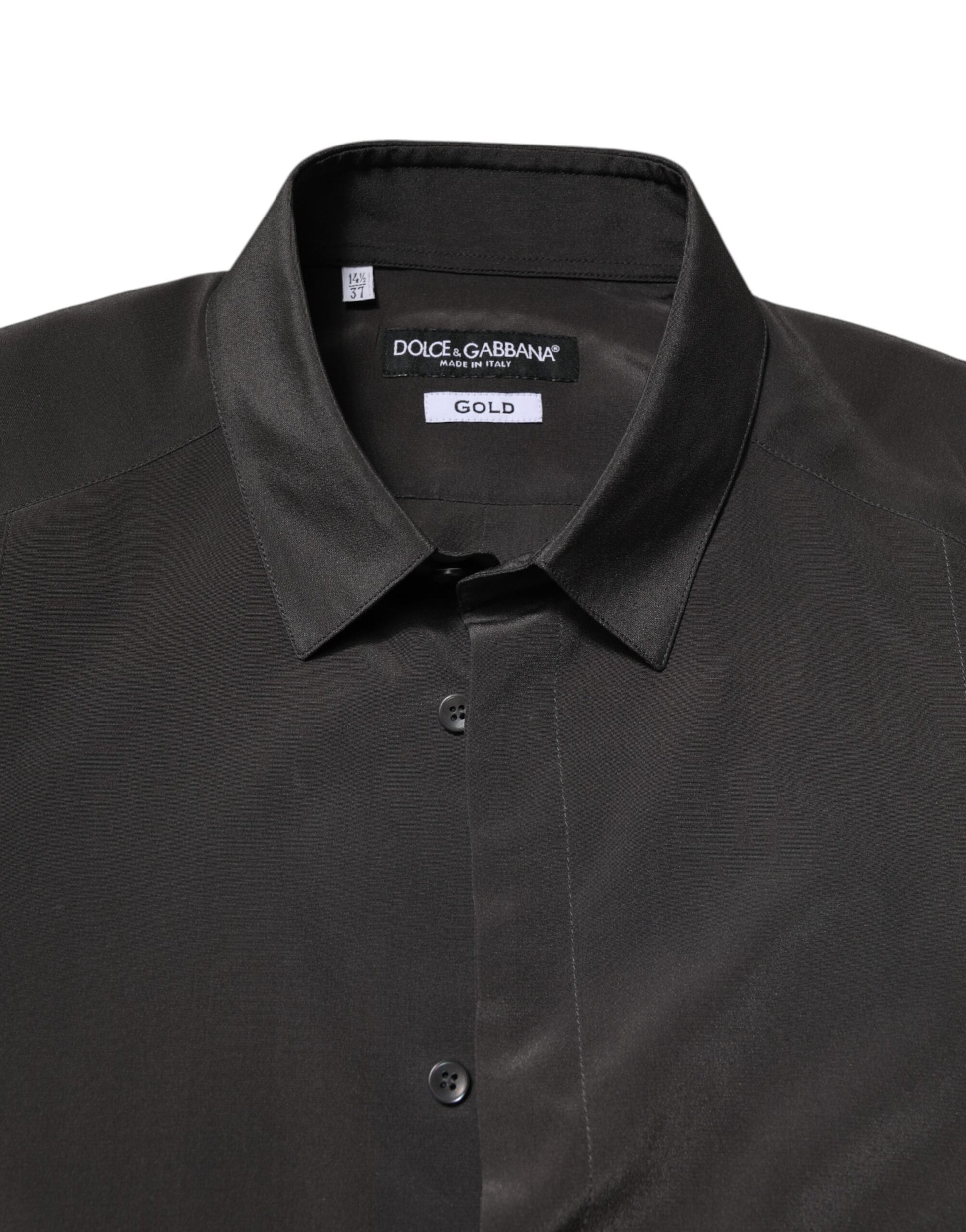 A dark gray silk shirt with a gold label from Dolce & Gabbana