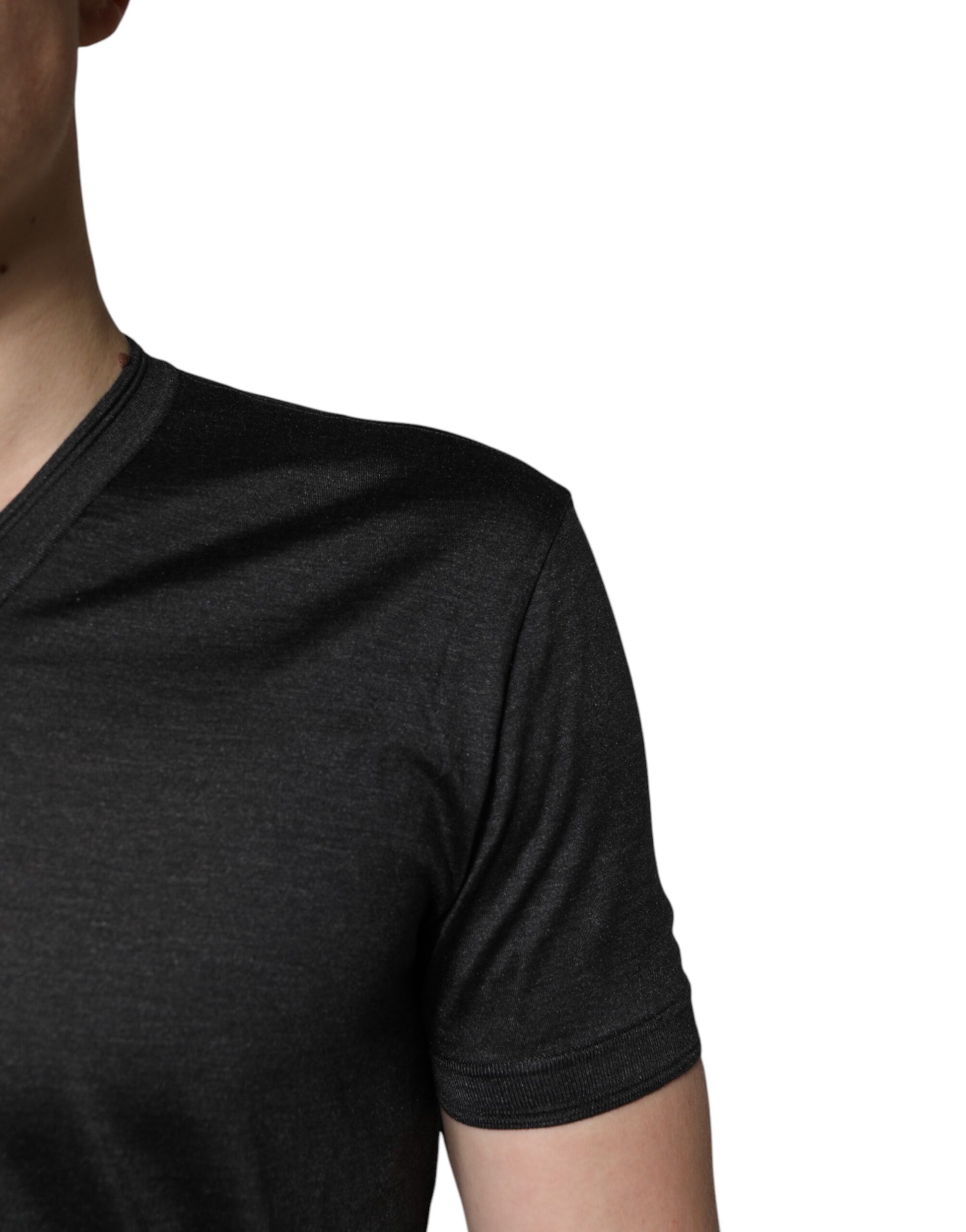 A person wearing a sleeveless top