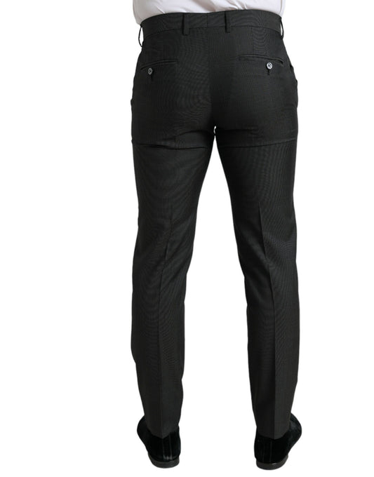 Pair of black trousers with pockets on sides