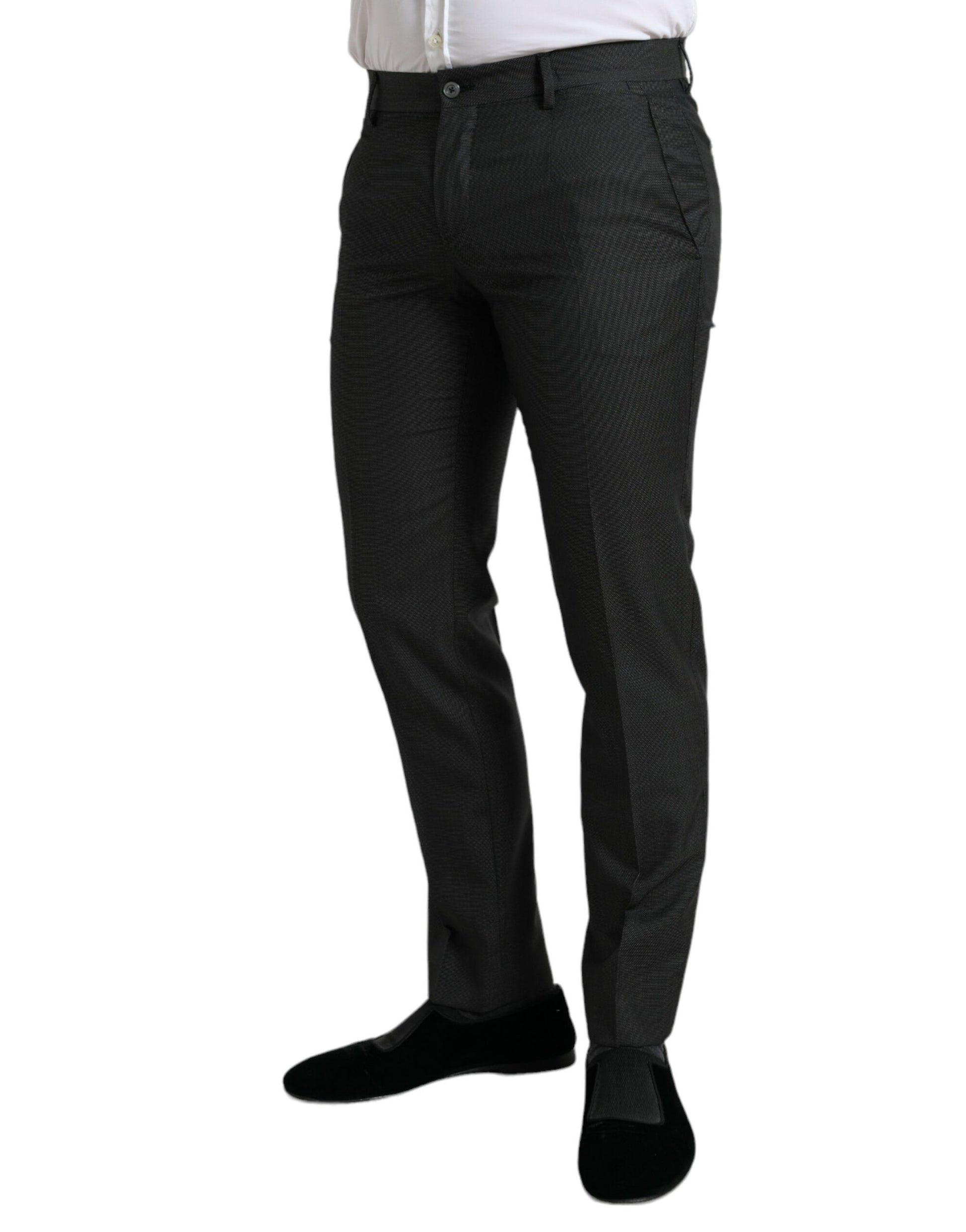 Man wearing black pants and a white shirt