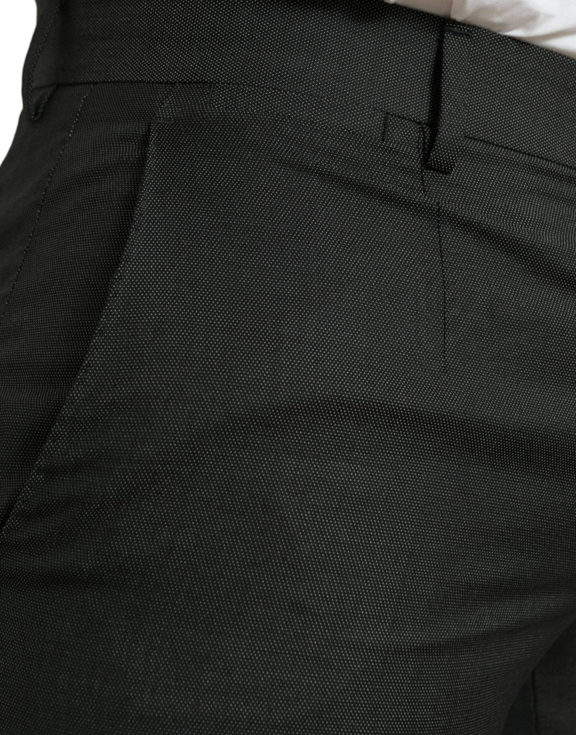 Pair of black trousers with a patterned texture