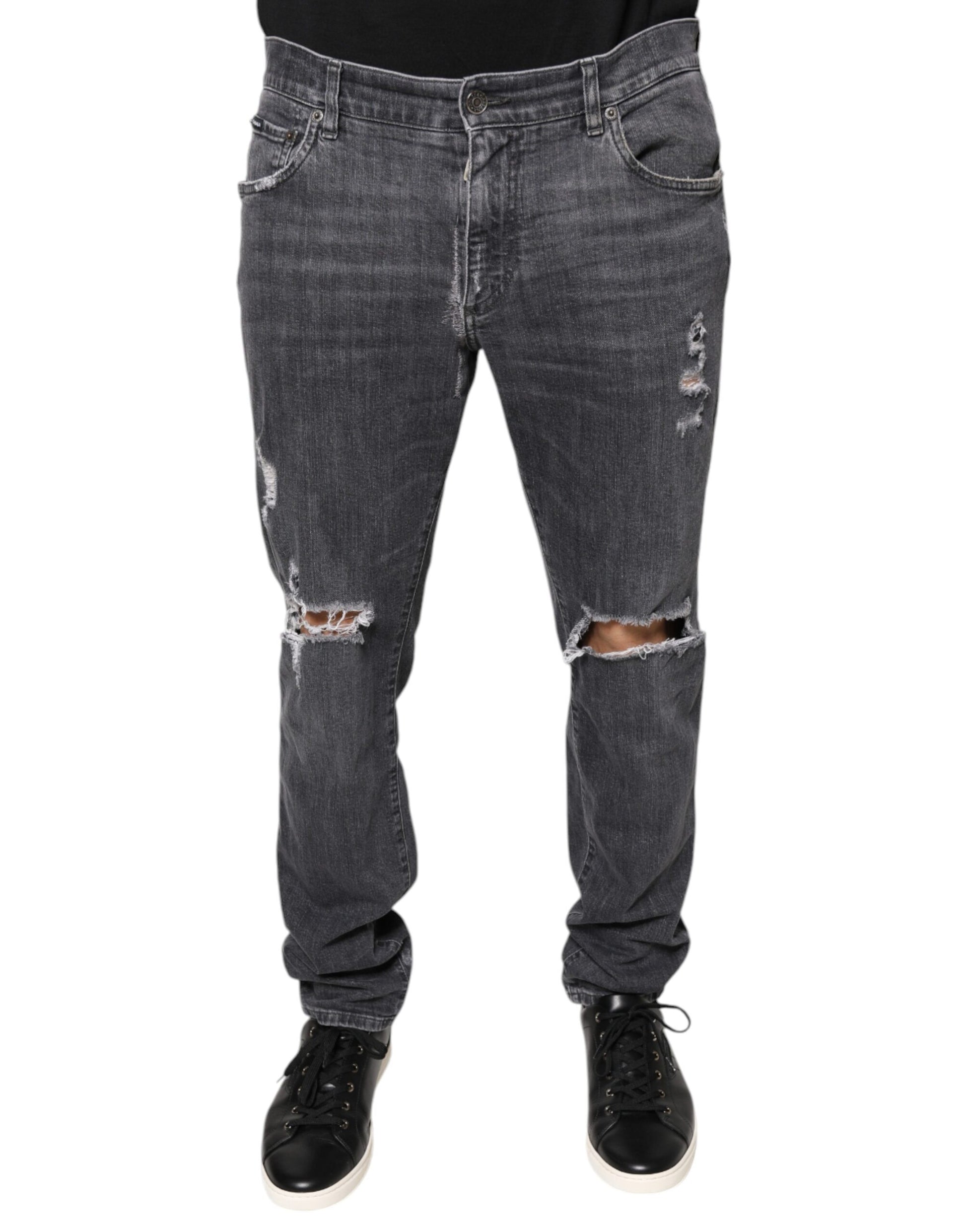 Pair of blue denim jeans with distressed details
