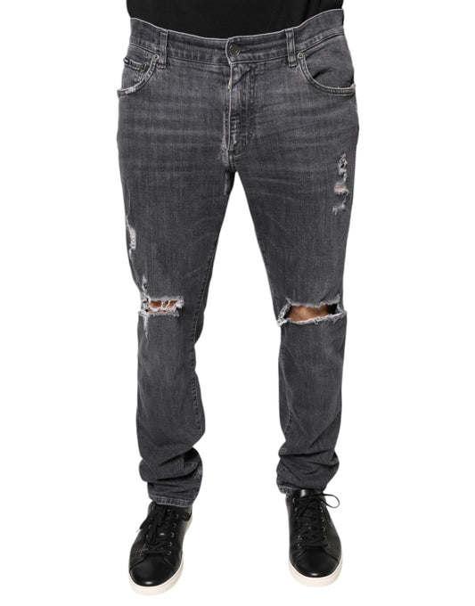 Pair of blue denim jeans with distressed details