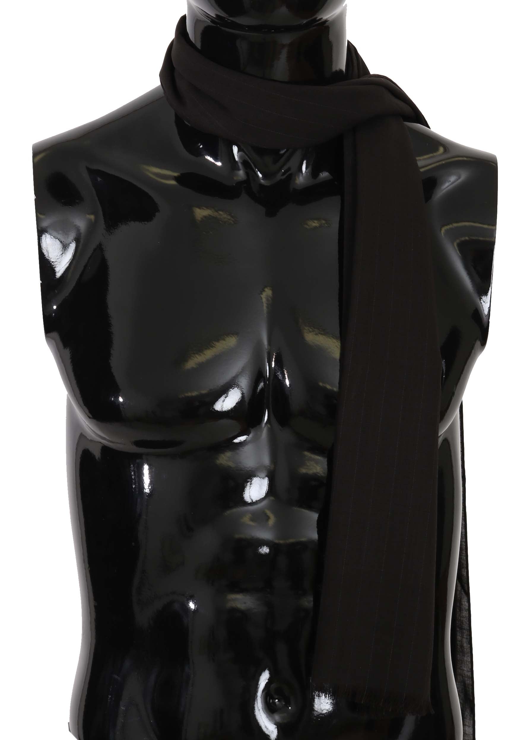 Black mannequin torso wearing a black scarf