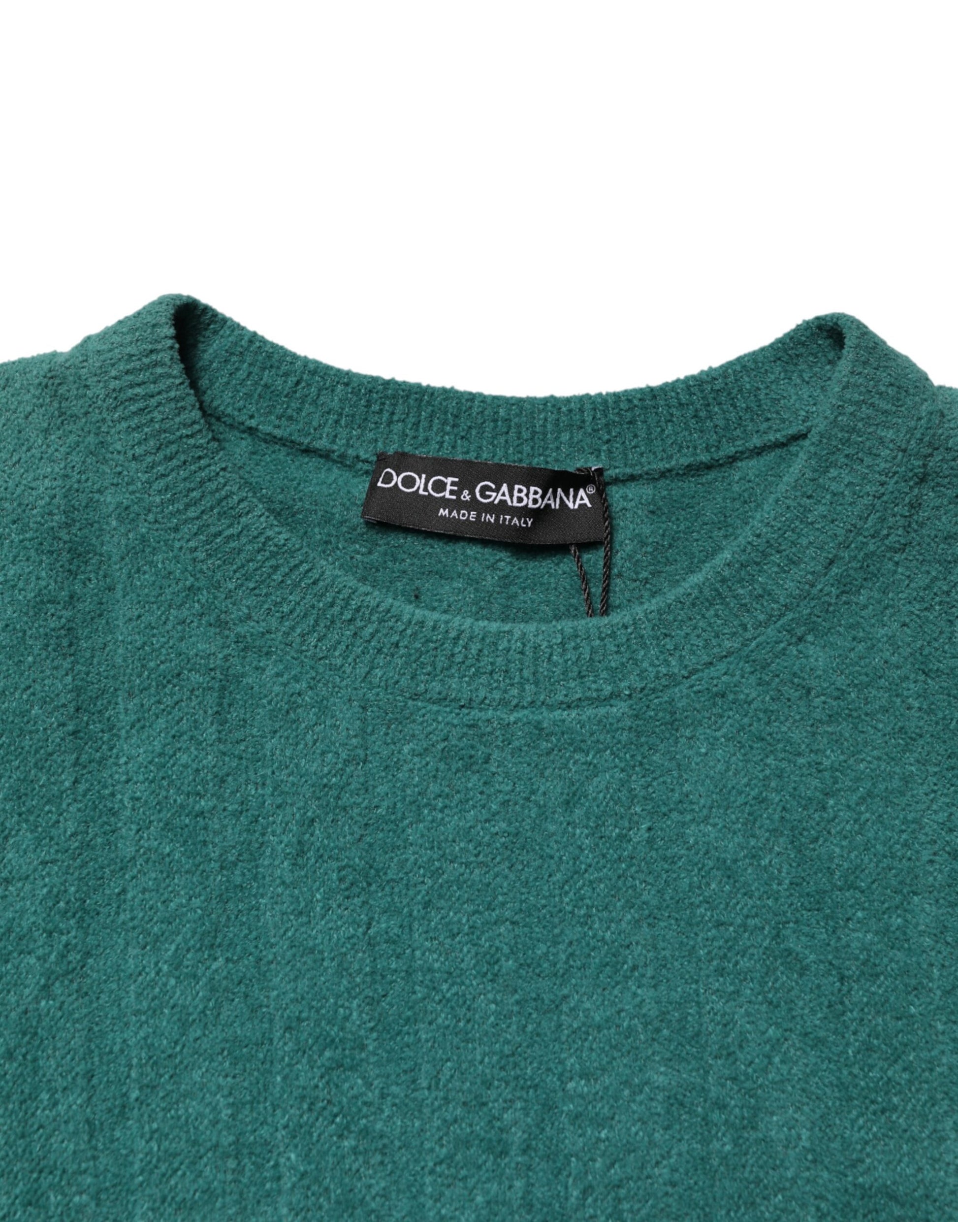 Green sweater on hanger