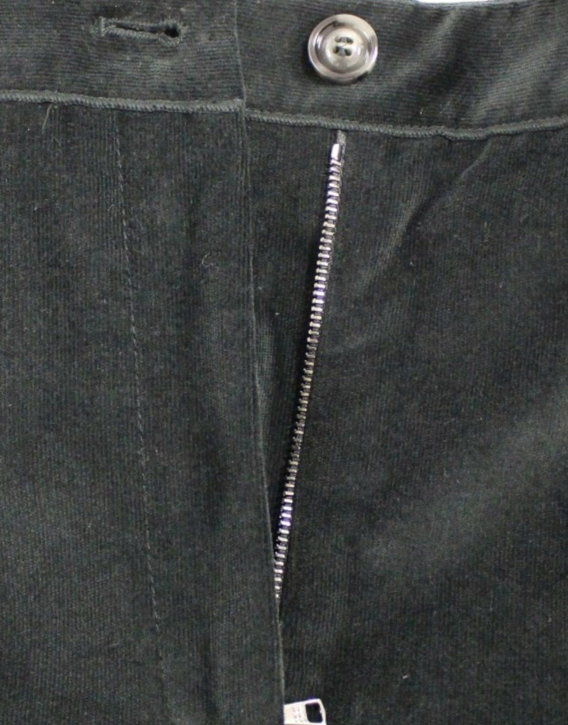 Zipper on front of black pants