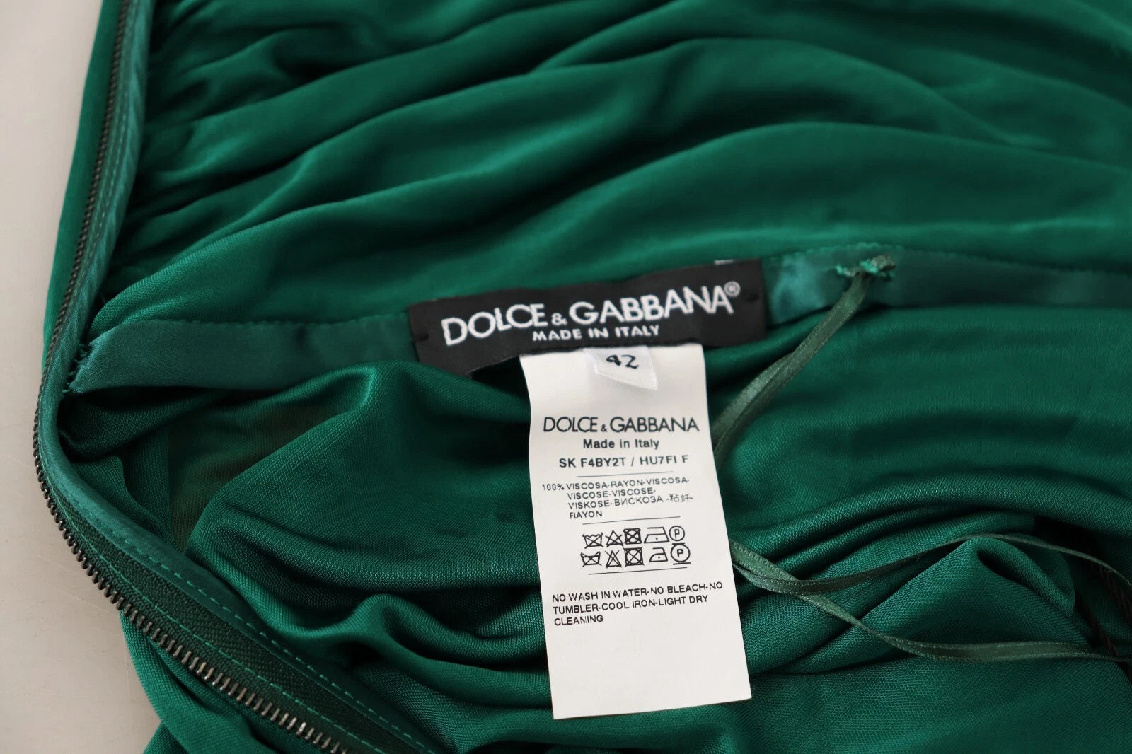 Green fabric with brand label on front
