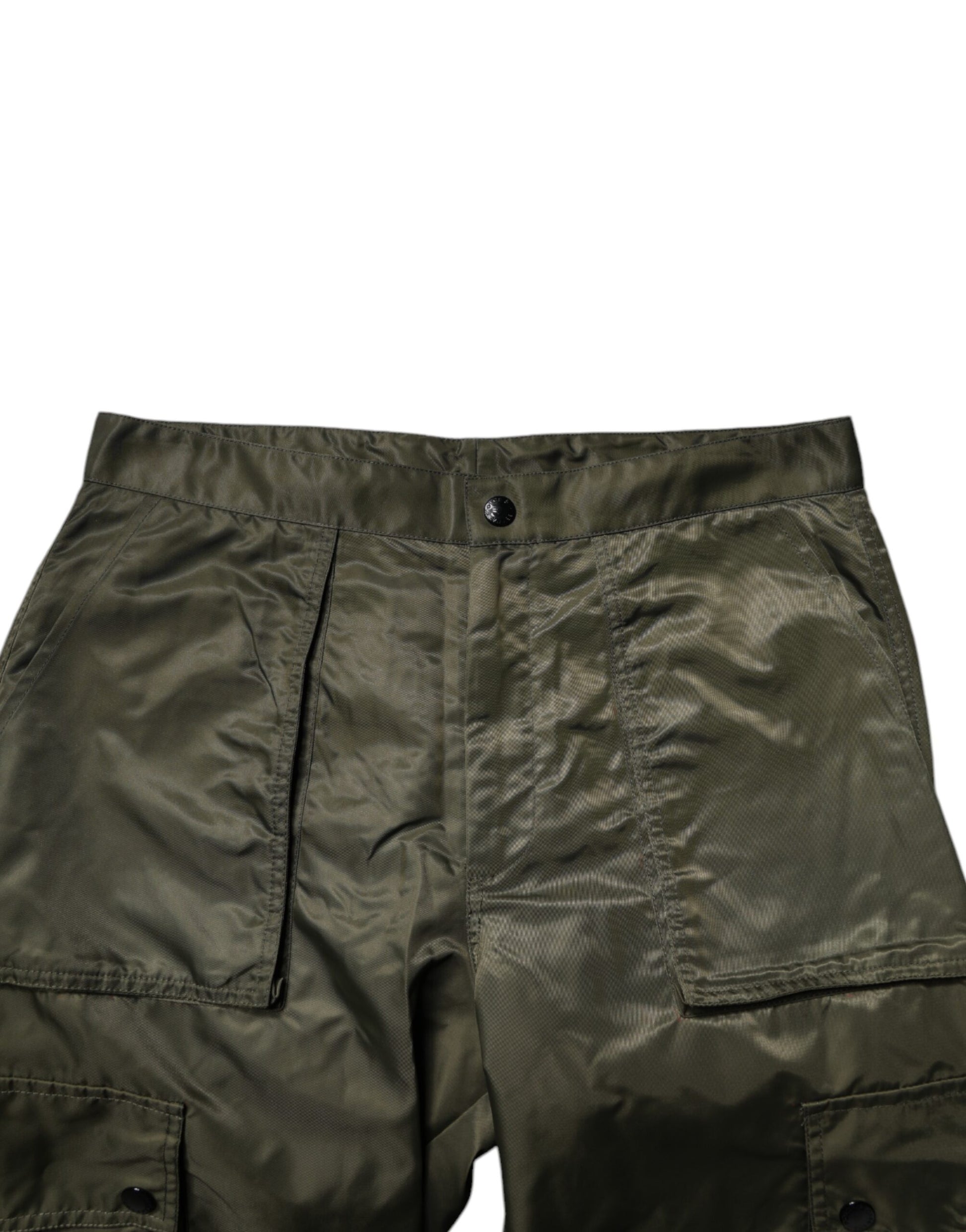 Shorts are olive green with pockets on sides