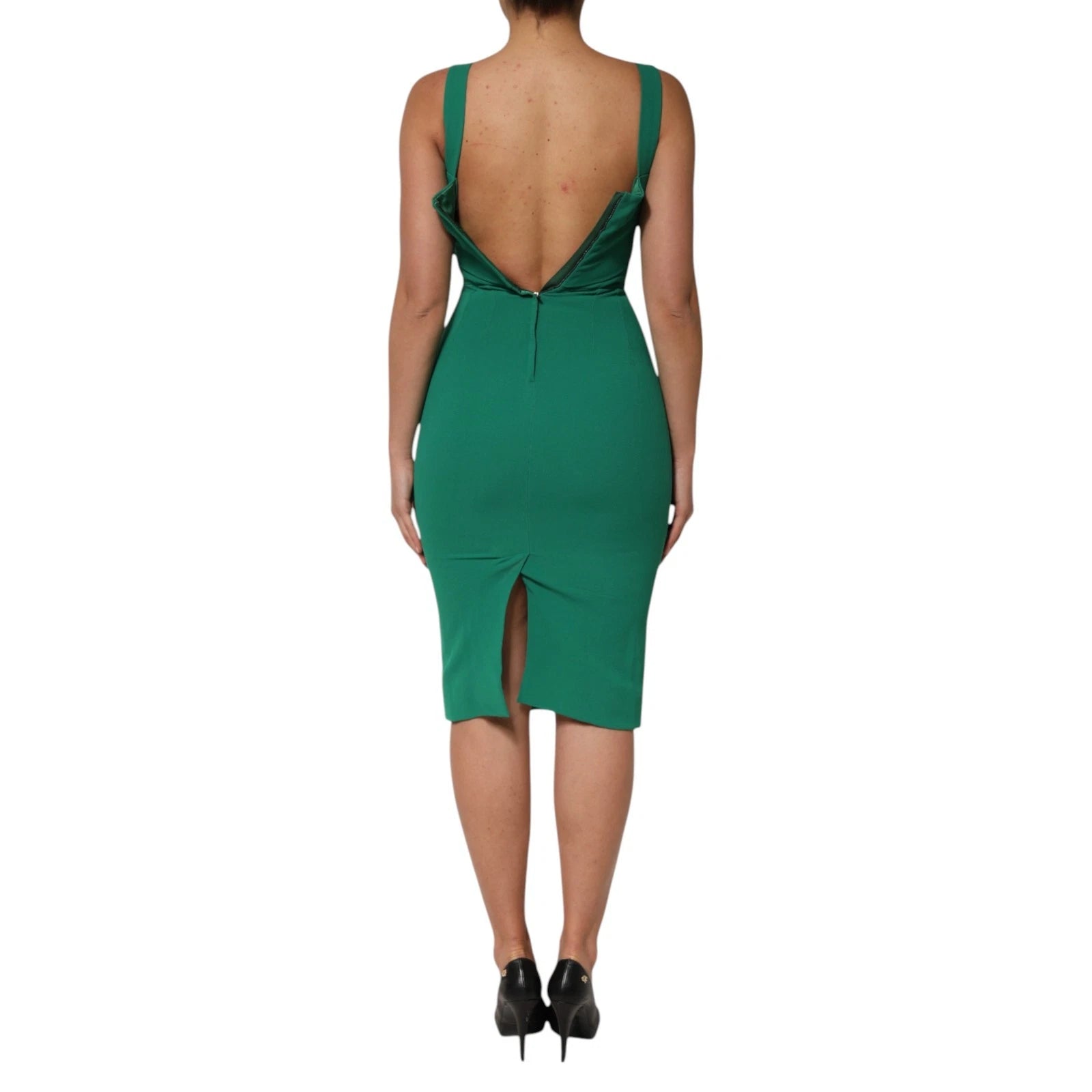 A sleeveless, dark green bodycon dress with a high slit on the back