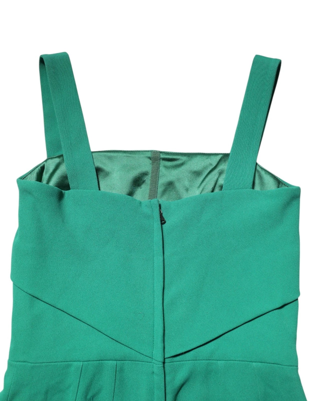A sleeveless, dark green bodycon dress with a V-neckline and zipper closure