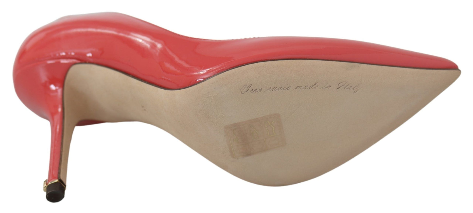 Red high heel shoe with a brown sole and a red bow on top