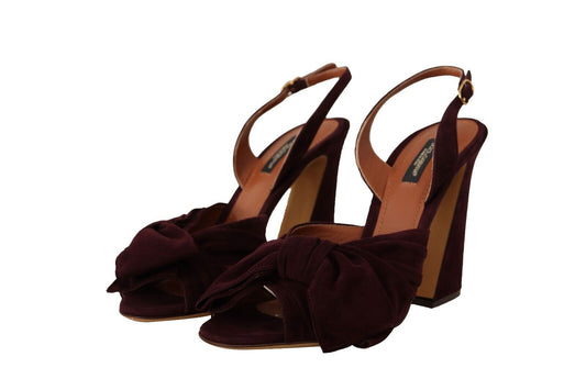 Pair of women's high heel sandals with velvet straps and wooden heels