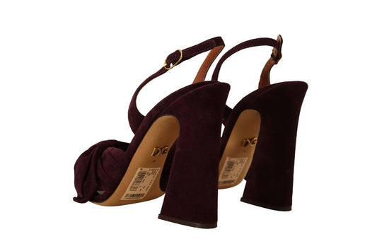 Pair of high heel shoes with brown straps and a label on the insole