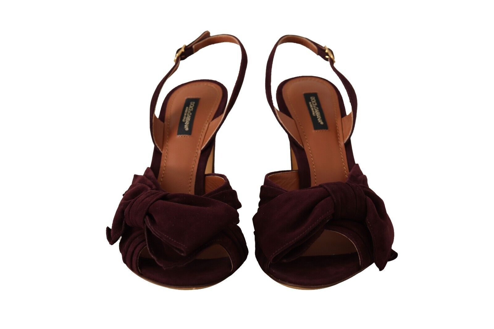 Pair of women's sandals with ruffled straps and a bow on top