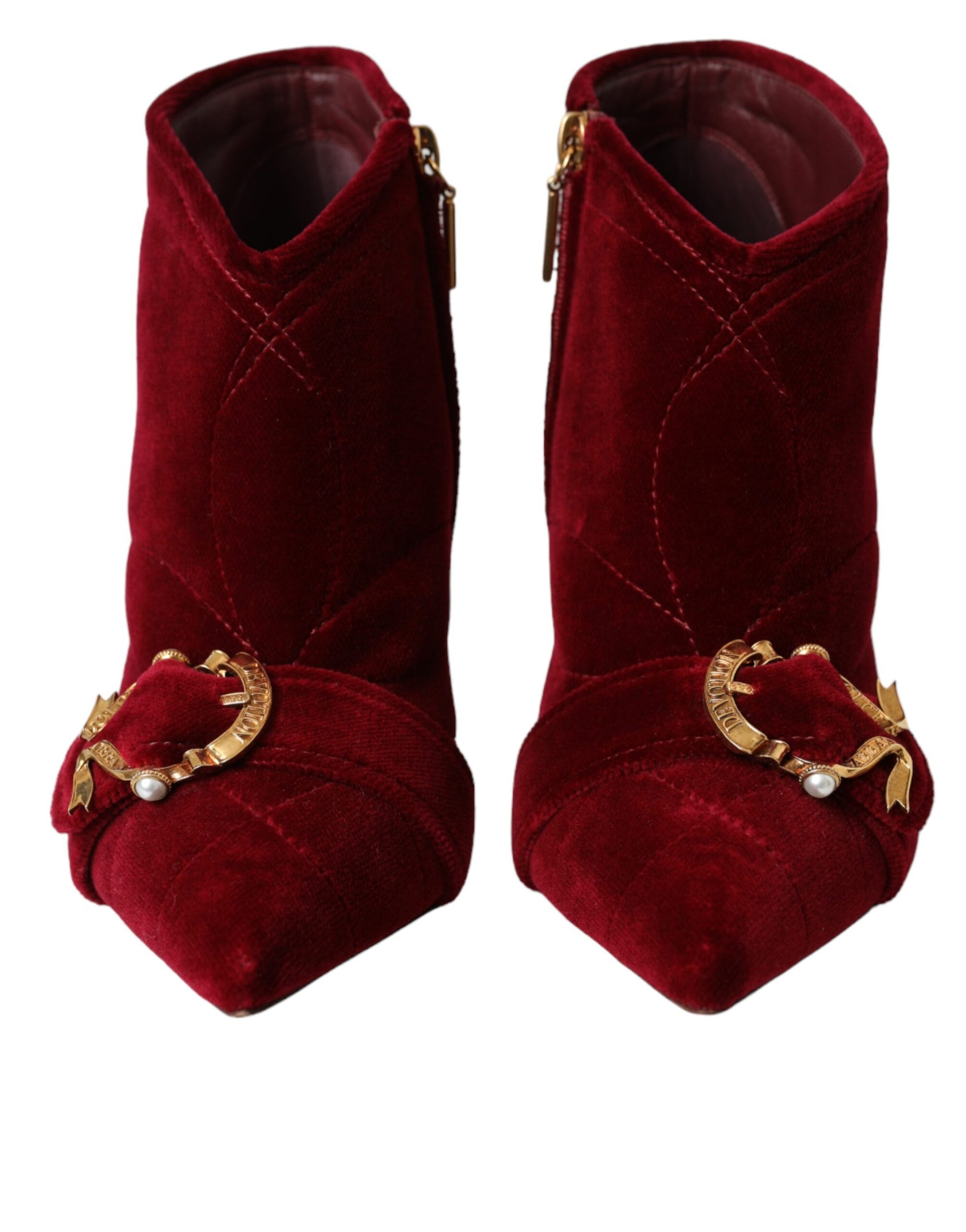 Pair of red velvet boots with gold buckles